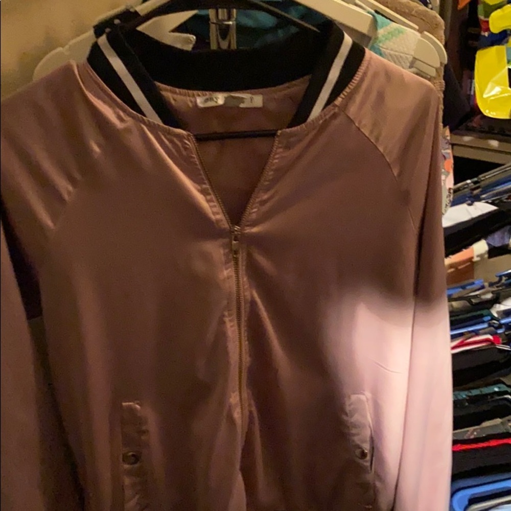 A pink black and white stripped jacket